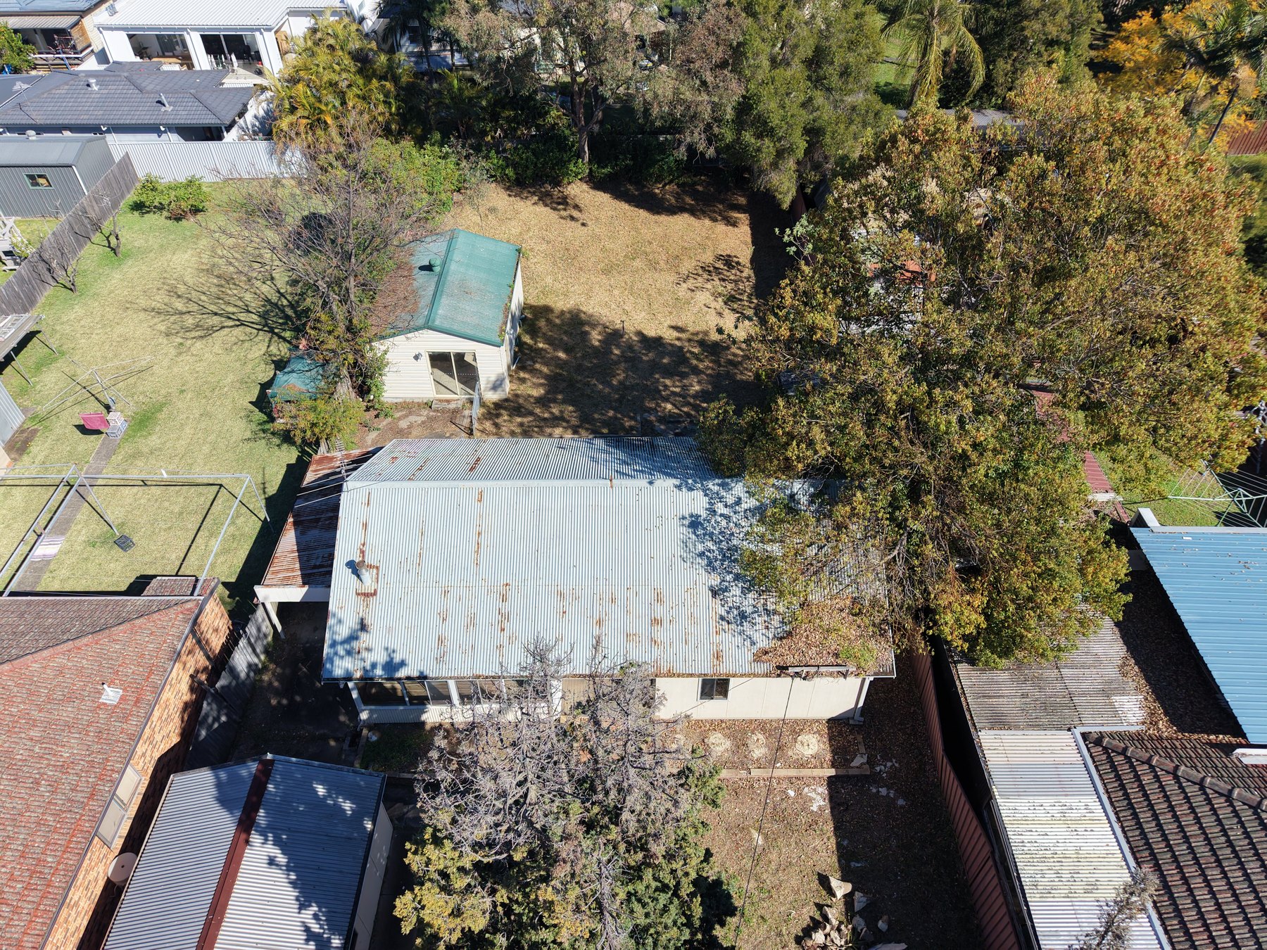 Closer aerial view of the building and outdoor spaces